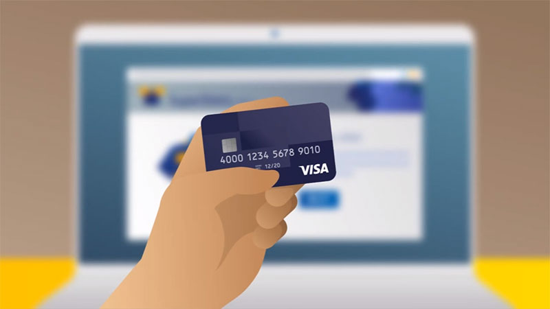 Graphic of a customer using their Visa card to make a safe online shopping transaction